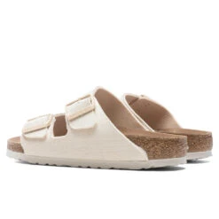 Birkenstock Women's Narrow Arizona Vegan - Eggshell -Birkenstock Store Birkenstock Women s Narrow Arizona Vegan Eggshell 1022679 05 29 22 Feature DV 4