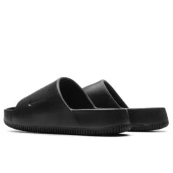 Nike Calm Slide - Black 9 Nike Calm Slide - Black -Birkenstock Store Calm Slide Black FD4116 001 08 02 23 Feature KN 5