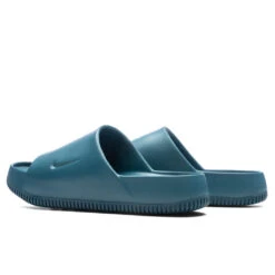 Nike Calm Slide - Geode Teal -Birkenstock Store Calm Slide Geode Teal FD4116 300 10 04 23 Feature KN 5