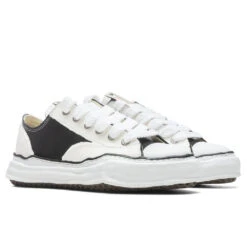 Peterson Low OG Sole Rubber Painted Canvas Sneaker - Black/White -Birkenstock Store Maison Mihara Yasuhiro Peterson Low OG Sole Rubber Painted Canvas Sneaker Black White A08FW716 BLW 06 06 22 Feature JORDAN 2