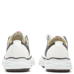 Peterson Low OG Sole Rubber Painted Canvas Sneaker - Black/White -Birkenstock Store Maison Mihara Yasuhiro Peterson Low OG Sole Rubber Painted Canvas Sneaker Black White A08FW716 BLW 06 06 22 Feature JORDAN 4