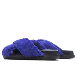 Marni Fussbett Slide Sandal - Royal 8 Marni Fussbett Slide Sandal - Royal -Birkenstock Store Marni Fussbett Slide Sandal Royal FBMR002501 P5441 00B56 04 23 23 Feature KN 5