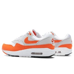 Nike Women's Air Max 1 '87 'Safety Orange' - Neutral Grey/Safety Orange/White -Birkenstock Store Nike Air Max 1 87 Women s Neutral Grey Safety Orange White DZ2628 002 10 08 23 Feature KN 5