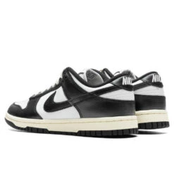 Nike Women's Dunk Low 'Vintage Panda' - White/Black/Coconut Milk -Birkenstock Store Nike Dunk Low PRM Women s White Black Coconut Milk FQ8899 100 10 09 23 Feature VR 4