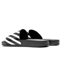 Diag Sliders - Black/White -Birkenstock Store Off White c o Virgil Abloh Diag Sliders Black White OMIC011C99MAT0011001 09 19 22 Feature JORDAN 3