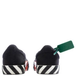 Low Vulcanized Canvas - Black/Sand 9 Low Vulcanized Canvas - Black/Sand -Birkenstock Store Off White c o Virgil Abloh Low Vulcanized Canvas Black Sand OMIA085F22FAB0011017 01 21 23 Feature KN 8