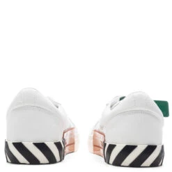 Low Vulcanized Canvas - White/Navy Blue 9 Low Vulcanized Canvas - White/Navy Blue -Birkenstock Store Off White c o Virgil Abloh Low Vulcanized Canvas White Navy Blue OMIA085C99FAB0010146 04 11 23 Feature VR 10