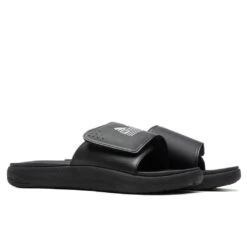 Puma X TMC SoftRide Slides - Black/White 8 Puma X TMC SoftRide Slides - Black/White -Birkenstock Store Puma Soft Ride x TMC Black 38505002 09 12 22 Feature JAYLEEN 4