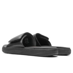 Puma X TMC SoftRide Slides - Black/High Risk Red -Birkenstock Store Puma Soft Ride x TMC Black 38505003 09 24 22 Feature MG 10