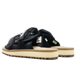 Suicoke Moto Cab Eco - Black/Beige 9 Suicoke Moto Cab Eco - Black/Beige -Birkenstock Store Suicoke Moto Cab Eco Black Beige OG 056CAB ECO BLKBEI 05 23 22 Feature JM 3