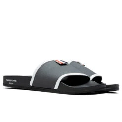 Rubber Pool Slide - Dark Grey -Birkenstock Store Thom Browne Rubber Pool Slide Dark Grey MFL054A 05690 025 08 30 22 Feature JORDAN 2